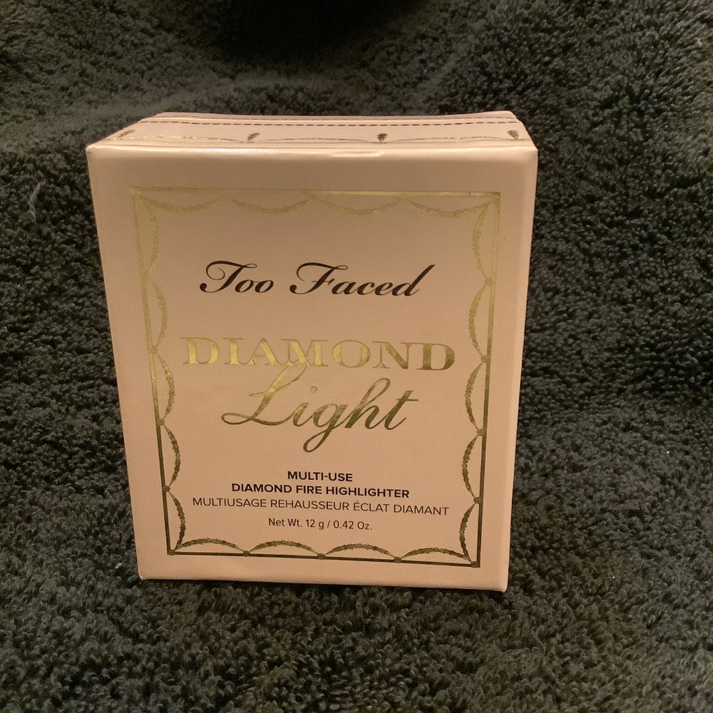 Two Faced multi-use diamond fire highlighter. .42 oz. NWOT